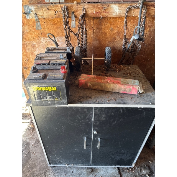 Small cabinet with four batteries, all contents included, including Arctec welding rods. condition u