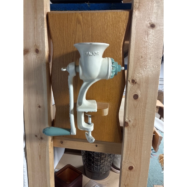  vintage Major brand cast iron hand-operated meat grinder or mincer, typically used for processing m