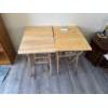 Image 1 : Four folding wood TV dinner stands, 19 inches wide by 14 and a half inches deep by 26 inches high