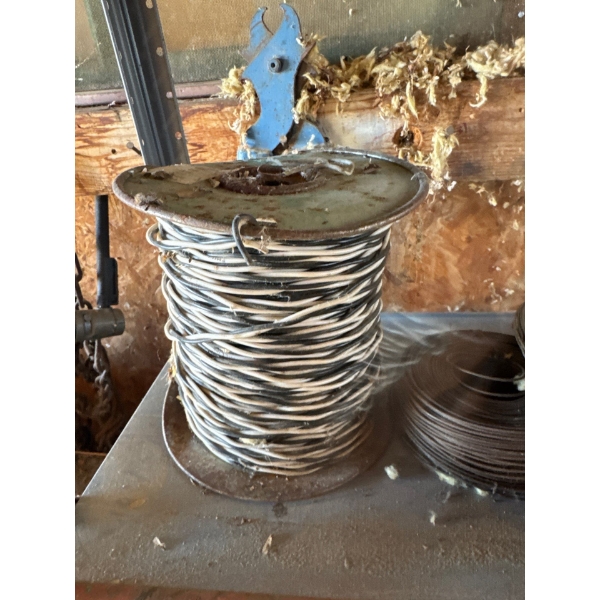 Steel rack, all contents included.copper tube and wire rolls