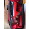 Image 3 : Milwaukee M12 cordless multi-tool with 12V Lithium-Ion battery, charger, and Milwaukee branded carry