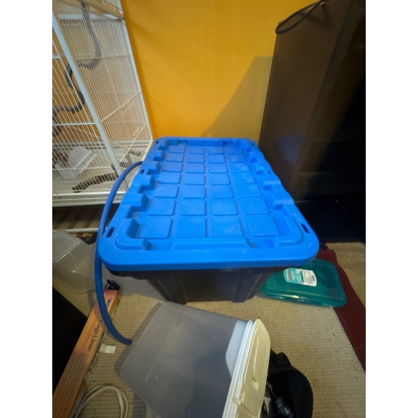 Like new Rubbermaid container, unknown contents inside included.