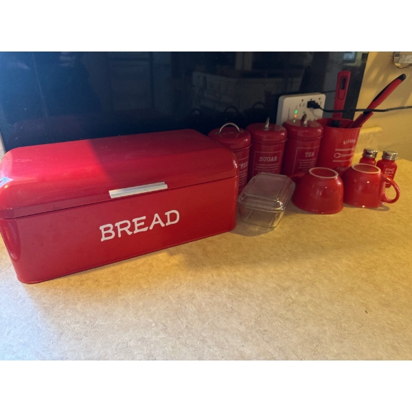 Matching Red kitchen set, mugs, bread box, sugar cannister, coffee cannister, tea cannister, utensil