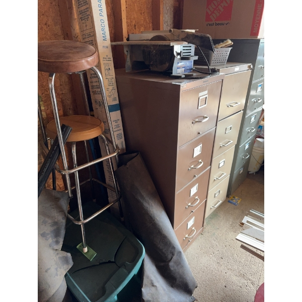 Three 4-drawer metal filing cabinets in brown, tan, and gray finishes. Each cabinet features label h