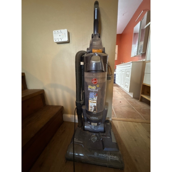 A Hoover WindTunnel Pet Rewind plus bagless upright vacuum cleaner