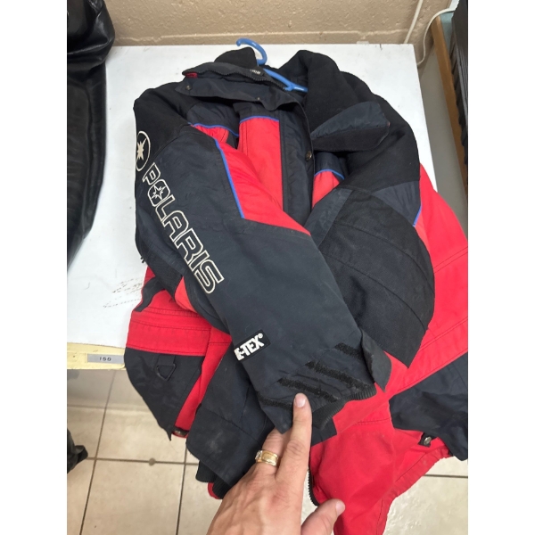 Polaris E-TEX branded snowmobile jacket is likely a vintage model from the 1990s or early 2000s, oft
