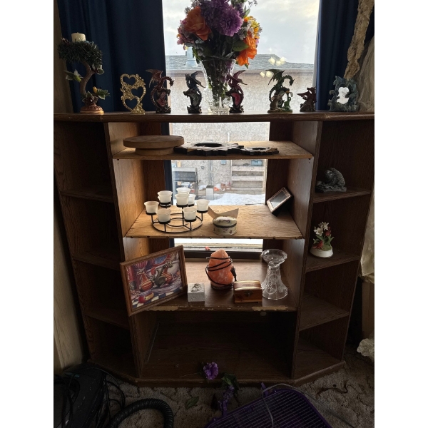  cabinet with dragon figurines. All contents included. 53 wide by 51 high by 16 deep.