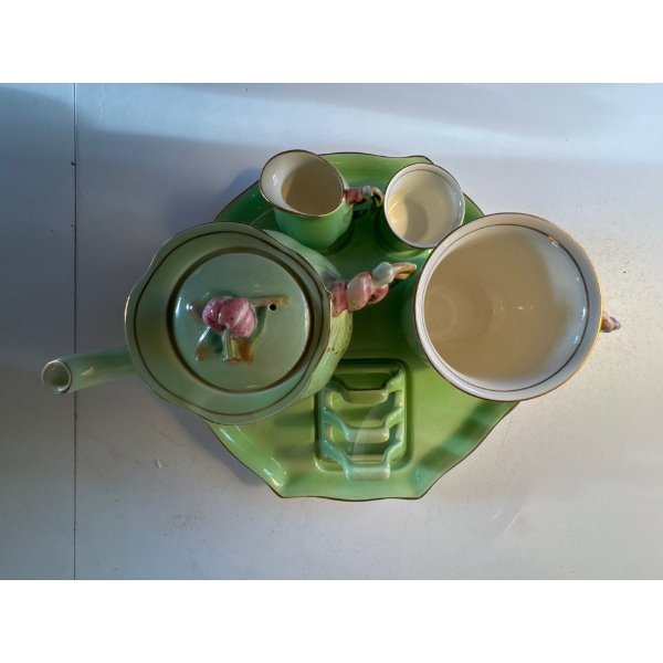 vintage Royal Winton Grimwades green "Tiger Lily" or "Rosebud" breakfast set for one. 
The set typic