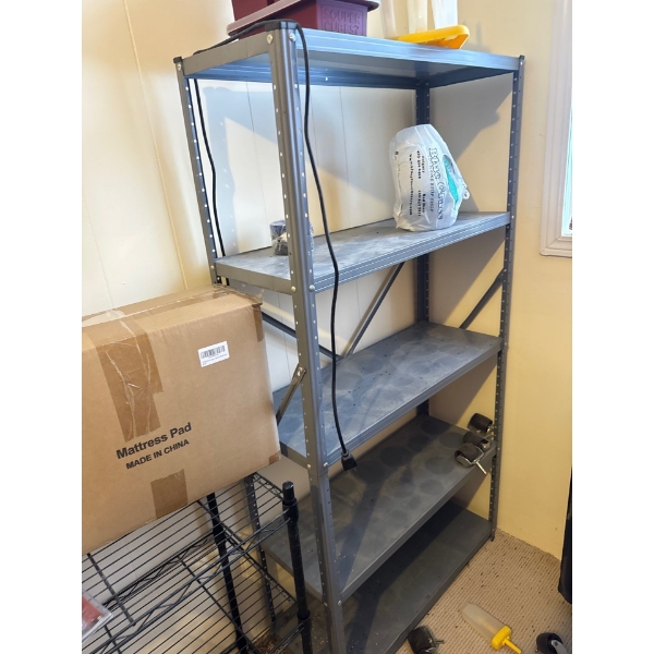 Steel rack. 30in long, 58in tall and 11.5in deep