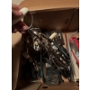 Image 5 : Variety of kitchen utensils, such as stainless steel egg beaters, kitchen knives with black handles,
