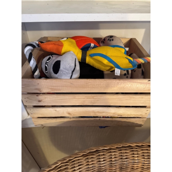 Wood crate full of dog toys. Brand new chew toys