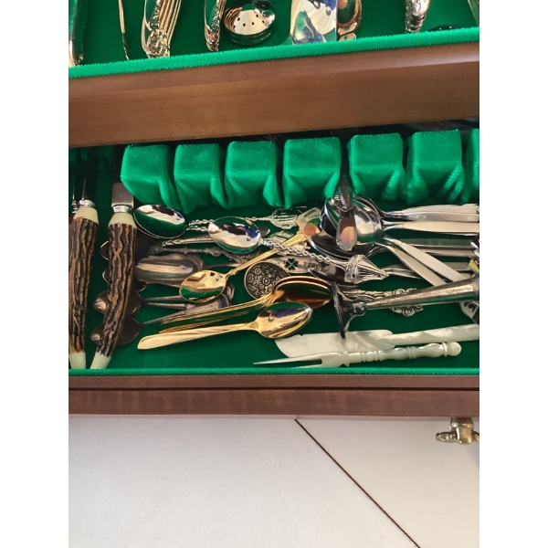 This is a set of silverplate flatware,  "Heritage" pattern by 1847 Rogers Bros. 
The set is stored i