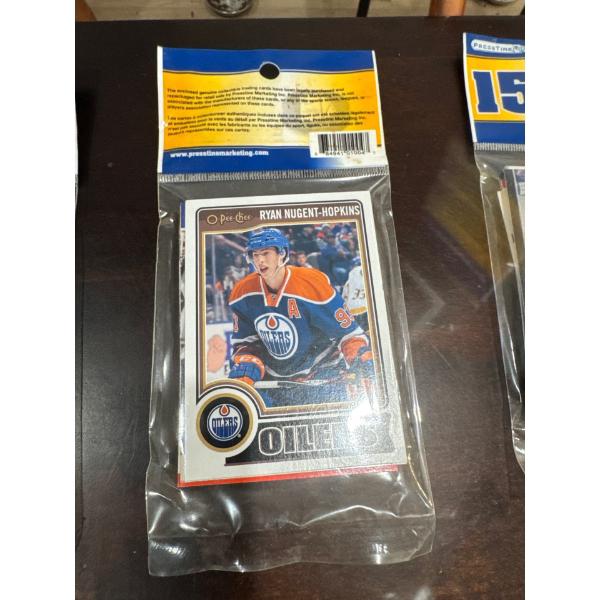 15 hockey cards brand new inset.