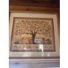 Image 2 :  framed needlework sampler titled "Peaceable Kingdom," designed by artist Ellen Stouffer. 
Artist: E