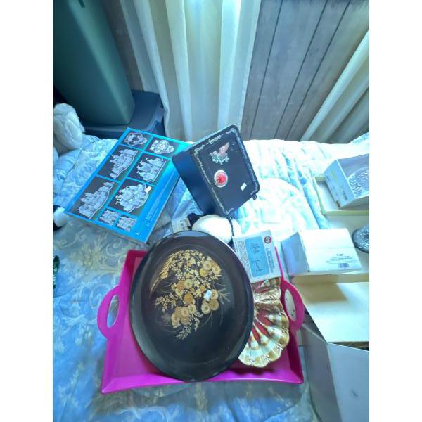  decorative plates, which are likely from the Bradford Exchange and feature art by Thomas Kinkade. 
