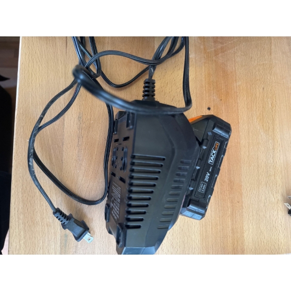 Tacklife 20V Max Lithium-Ion battery charger kit, commonly used for cordless power tools. 
Battery C