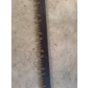 Image 4 : Steel bow saw featuring a curved frame and toothed blade, suitable for cutting wood. The frame displ
