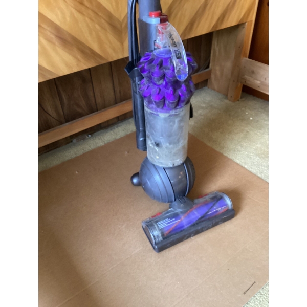  Dyson DC50 Ball Compact Animal bagless upright vacuum in a purple color scheme. Key features includ