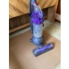 Image 1 :  Dyson DC50 Ball Compact Animal bagless upright vacuum in a purple color scheme. Key features includ