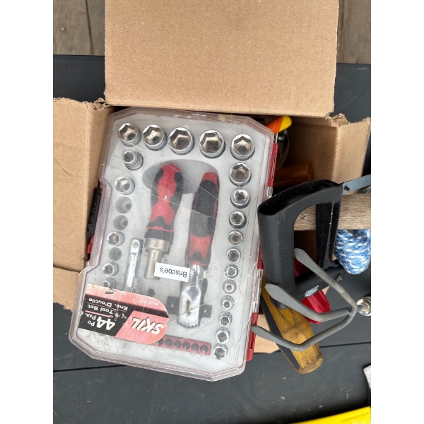 Box of tools, brand new inbox, new hand saw and hand tools, various tools inbox.