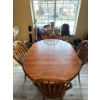 Image 1 : Oak dining table in good condition with 4 matching chairs, table dimensions with one leaf in is 59.5