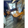 Image 4 :  wooden dining set with a drop-leaf or extendable table and matching chairs. 