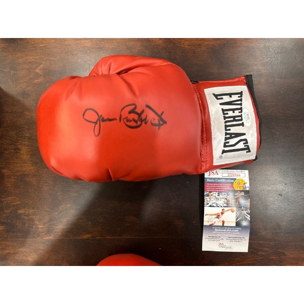 James Buster Douglas signed Everlast boxing glove. 
It features a black ink signature on a red glove