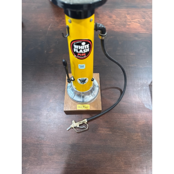 decorative replica of a 1920s Atlantic "White Flash Plus" gasoline pump, often sold as a novelty dec
