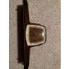 Image 1 : Junghans mantel clock with a wooden case and a geometric, angled face. Features gold tone hands, num