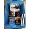 Image 1 : Large Tupperware container full of DVD's with a Lloyd's 7" widescreen DVD player