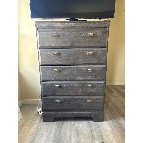 Tall dresser 31 and a half wide by 48 inches tall by 16 inches deep