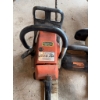 Image 1 : Stihl 024 AV gas chainsaw and a Remington 3.0 electric chainsaw with a 16-inch bar. Both chainsaws a