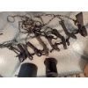 Image 8 : One metal blow torch with a wooden handle, one ribbed metal oil or fuel can, and a group of metal an