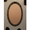 Image 2 : Oval metal frame with decorative floral design, containing a black and white photographic portrait o