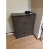 Image 3 : This vintage-style wooden dresser features ornate carved drawer fronts, brass-colored handles, and a