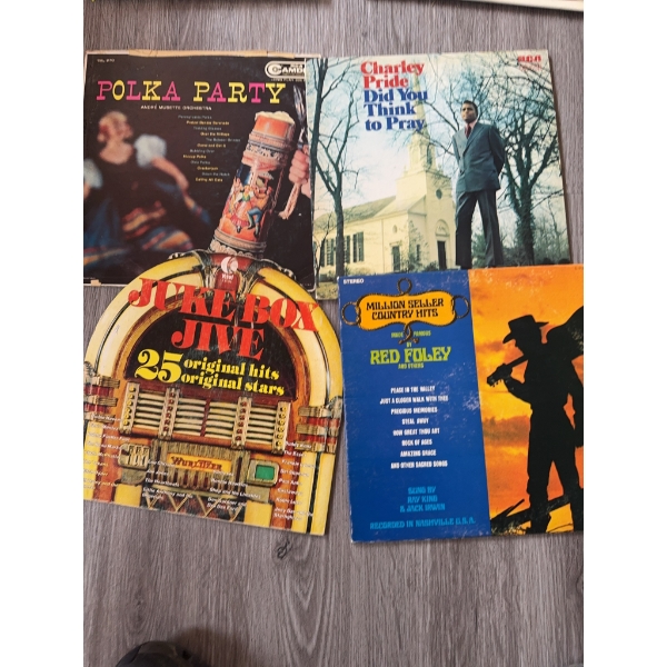 Four vinyl LP records: 'Polka Party' (Camden CAS-748), Charley Pride's 'Did You Think to Pray', 'Juk