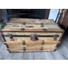 Image 5 : Wood and metal steamer trunk with exterior metal hardware and wooden slats. The exterior surface sho