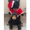 Image 4 : Plush bear wearing a Santa Claus jacket and hat, alongside a plush monkey. Both items are made of sy