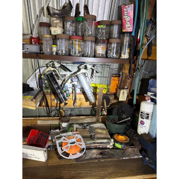 Grease guns, tools, various items, and more. All items included.