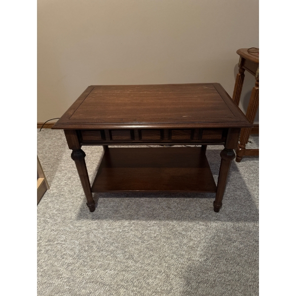 ark wood end table features a geometric apron design, a single side drawer, and a lower storage shel