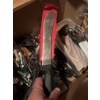 Image 3 : Variety of kitchen utensils, such as stainless steel egg beaters, kitchen knives with black handles,