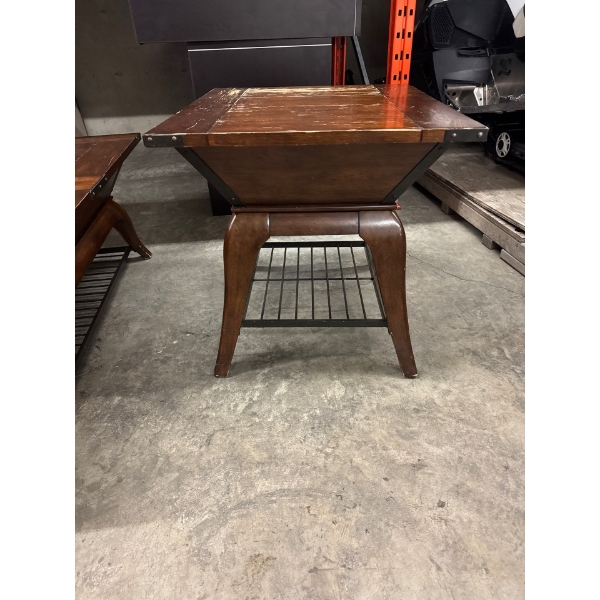 Side table to living room table. 28 inches long by 24 inches wide by 24 and a half inches high.