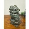 Image 4 : Foo Dogs or Fu Dogs. 
They are traditional Chinese guardian figures often placed in pairs to protect