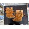 Image 1 : mukluks feature traditional fringe detailing, intricate beadwork on the vamp, and are lined for warm