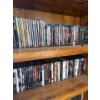Image 1 : Two shelves of Blu-Ray and DVDs