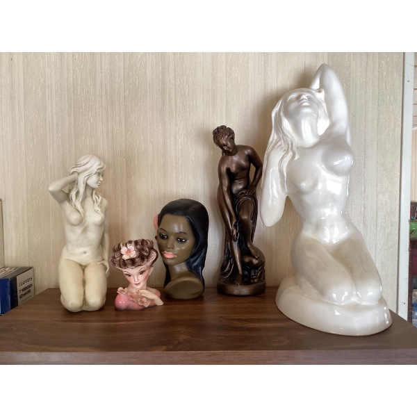 sculptures of women, naked.