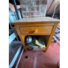 Image 2 : Wood nightstand with drawer, all contents included, such as a duct tape roll and new gate latches