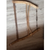 Image 2 : Wooden frame buck saw featuring a metal blade and tensioner, suitable for cutting wood. The saw incl