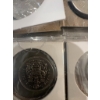 Image 20 : Canadian coins, featuring commemorative dollar coins and 50 cent pieces. Notable coins include a 197