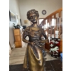 Image 1 :  bronze figurine representing a young woman in a rustic or rural setting, characteristic of late 19t